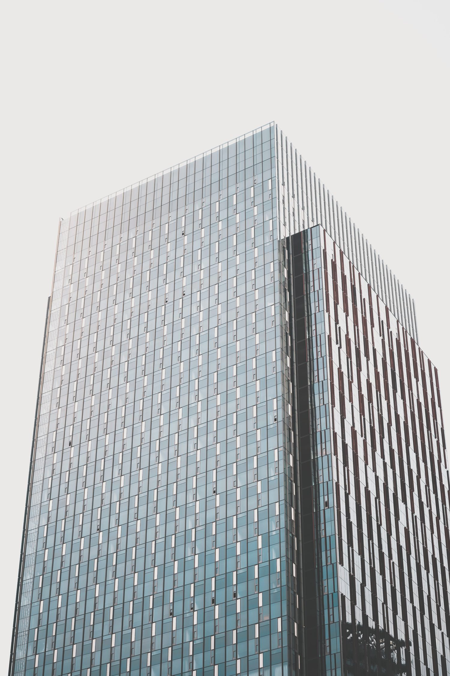 Modern glass office tower in a business district